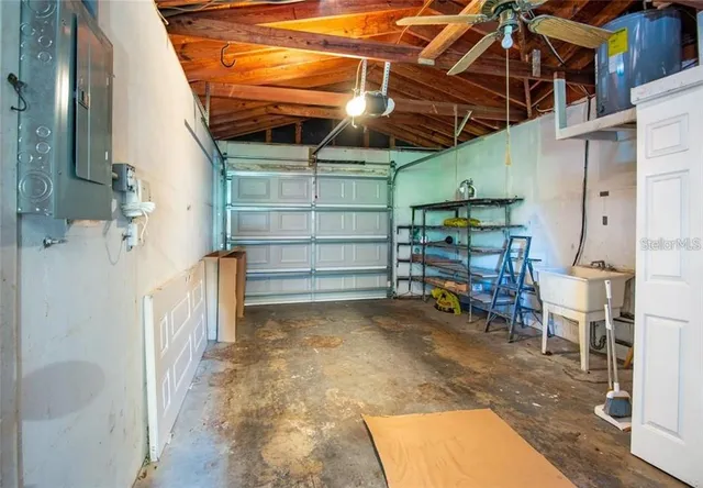 a view of a storage room with racks on the wall