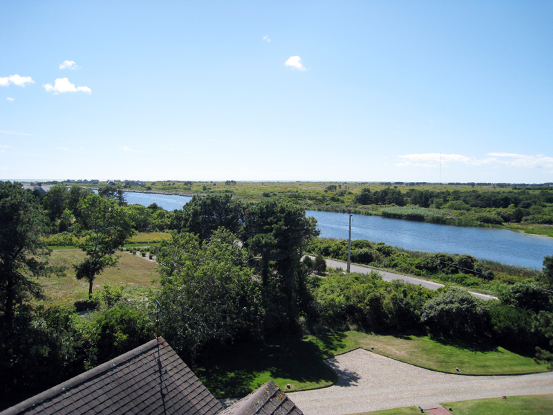94 Miacomet Road Nantucket, MA 02554 - Photo 15 of 18 a view of a lake with houses
