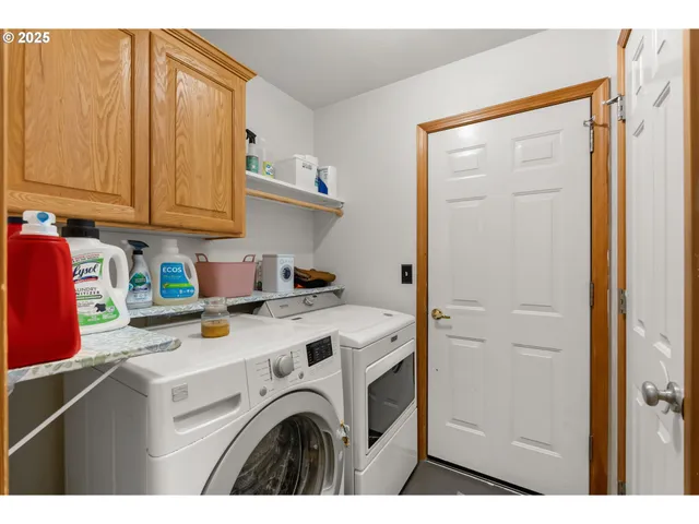 a bedroom with bed and a window