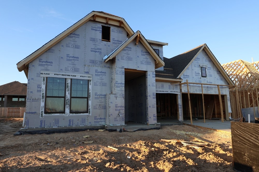 3351 Bentwood Ranch Drive Conroe, TX 77385 - Photo 3 of 16 a front view of a house with a yard