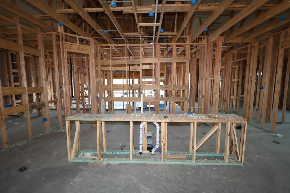 3351 Bentwood Ranch Drive Conroe, TX 77385 - Photo 7 of 16 a view of hall with kitchen