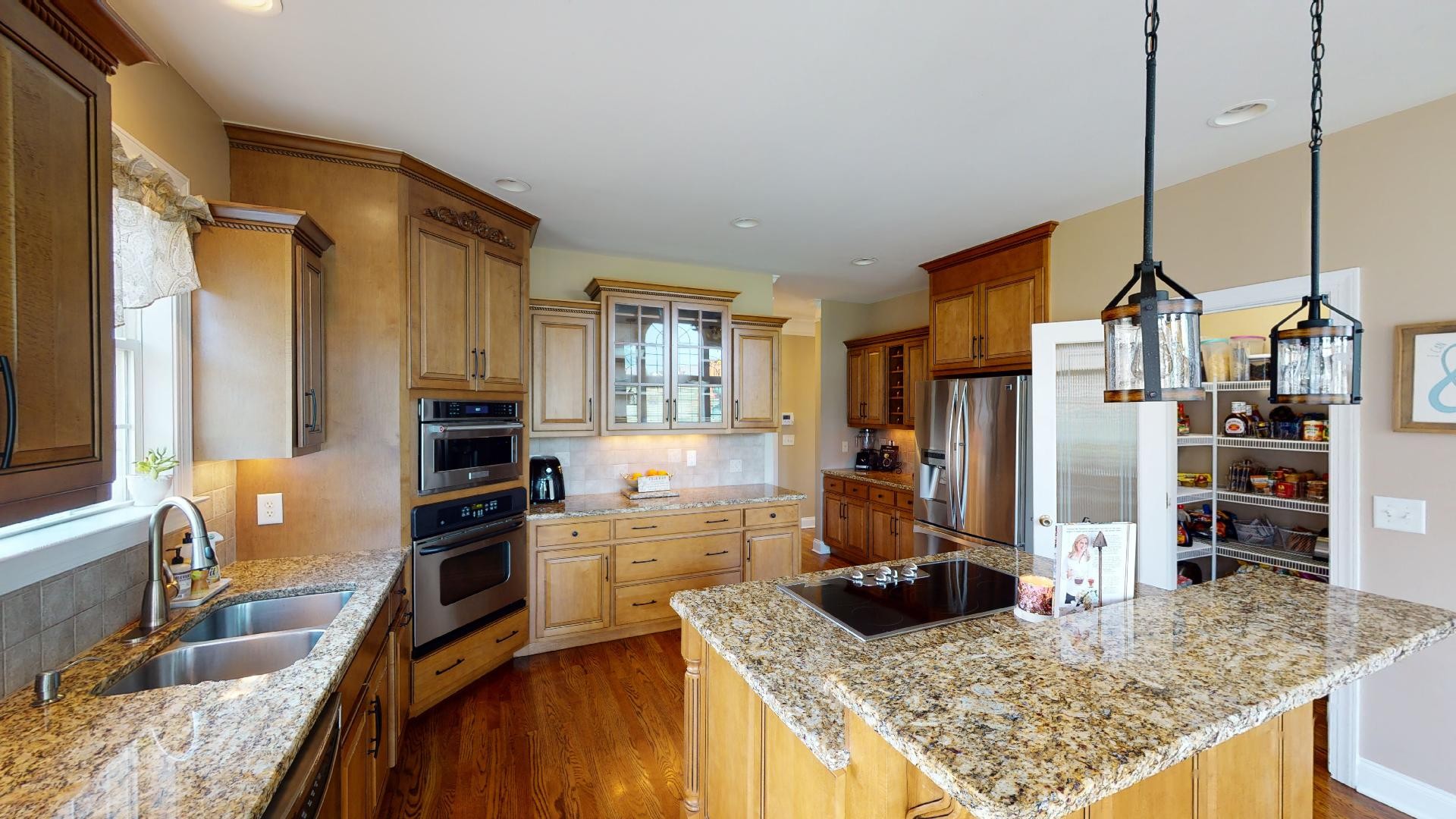 420 Ridgecrest Lane Lebanon, TN 37087 - Photo 12 of 29 a kitchen with stainless steel appliances granite countertop a sink stove and refrigerator