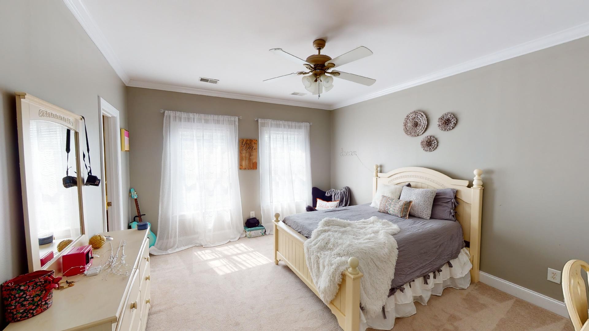 420 Ridgecrest Lane Lebanon, TN 37087 - Photo 19 of 29 a bedroom with a bed and a chandelier