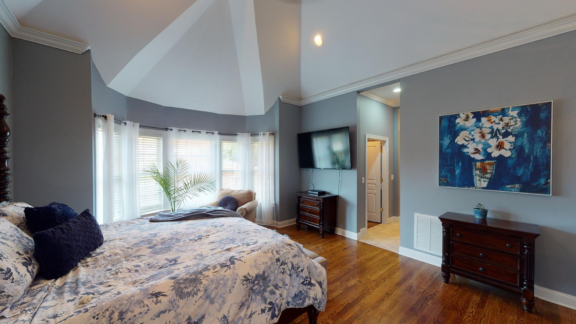 420 Ridgecrest Lane Lebanon, TN 37087 - Photo 8 of 29 a bedroom with a bed and a dresser next to a window