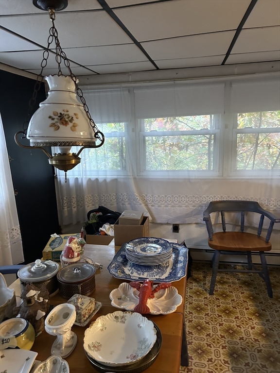 38 Joan Road Boston, MA 02136 - Photo 6 of 10 a table and chairs in a room