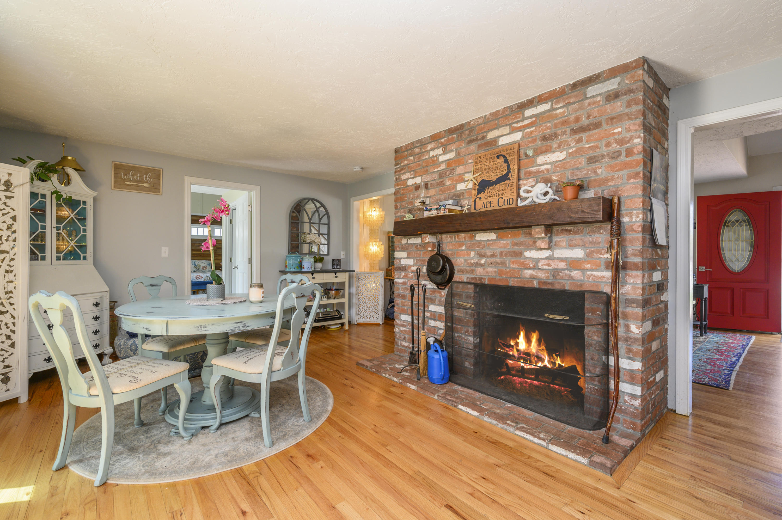 29 Old Kings Road Cotuit, MA 02635 - Photo 11 of 30 a view of a livingroom with furniture and a fireplace