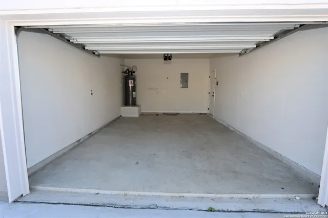 a bathroom with a granite countertop sink toilet a large mirror a bathtub and shower