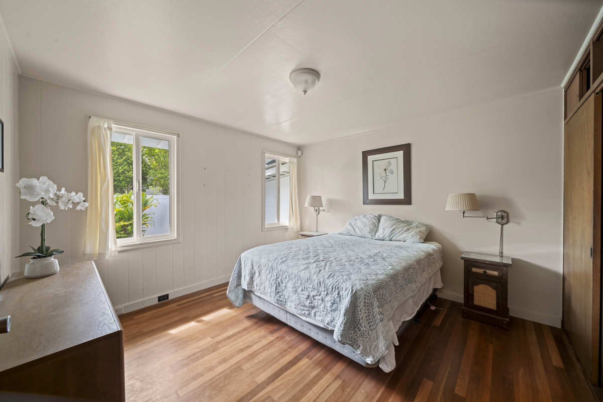 1808 Waianuenue Avenue Hilo, HI 96720 - Photo 12 of 30 a bedroom with a bed and a window