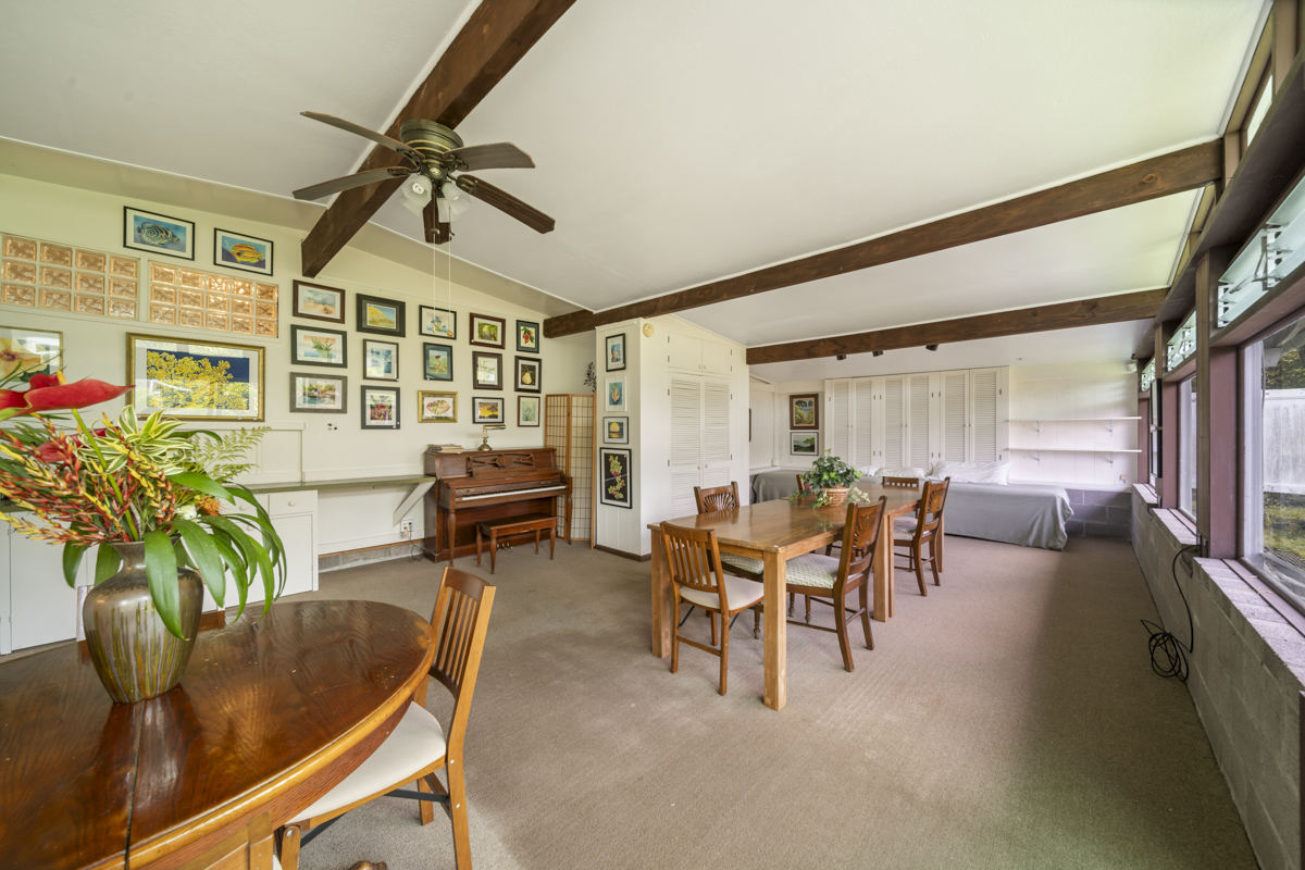 1808 Waianuenue Avenue Hilo, HI 96720 - Photo 13 of 30 a dining room with furniture window and wooden floor