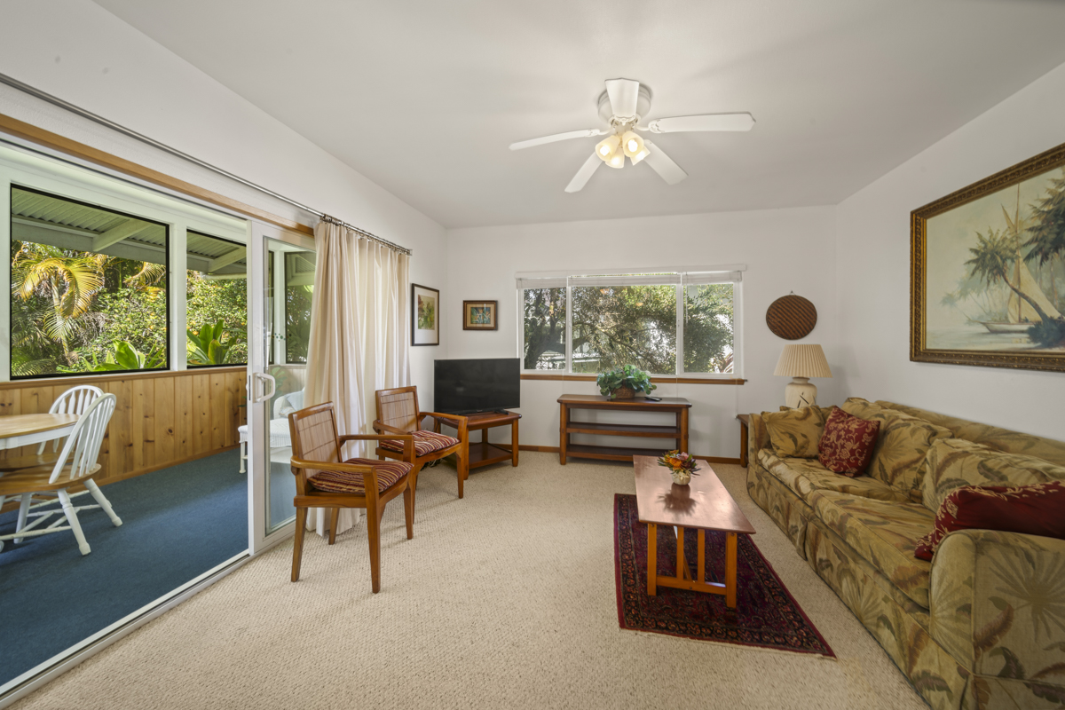 1808 Waianuenue Avenue Hilo, HI 96720 - Photo 23 of 30 a living room with furniture and a large window