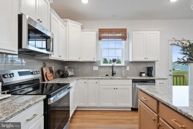 a view of living room kitchen and microwave
