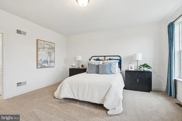 a room with a bed and a couch