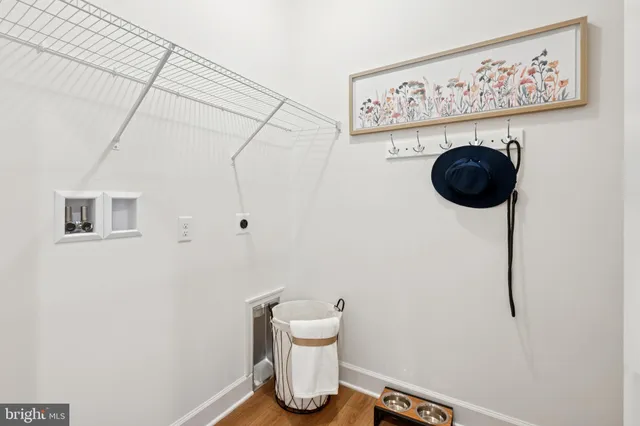 a view of a lake with houses in the back