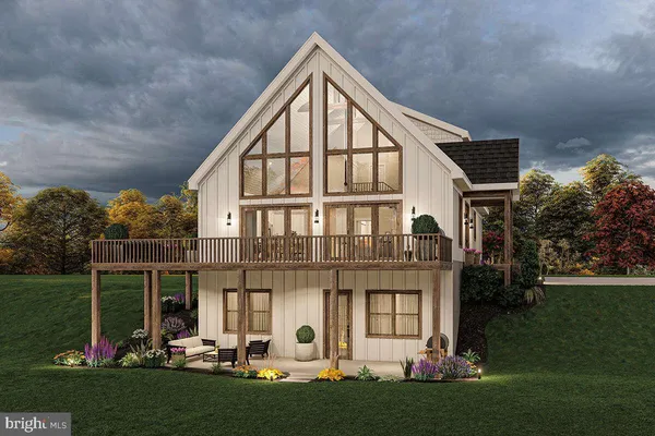 a view of a house with backyard and garden