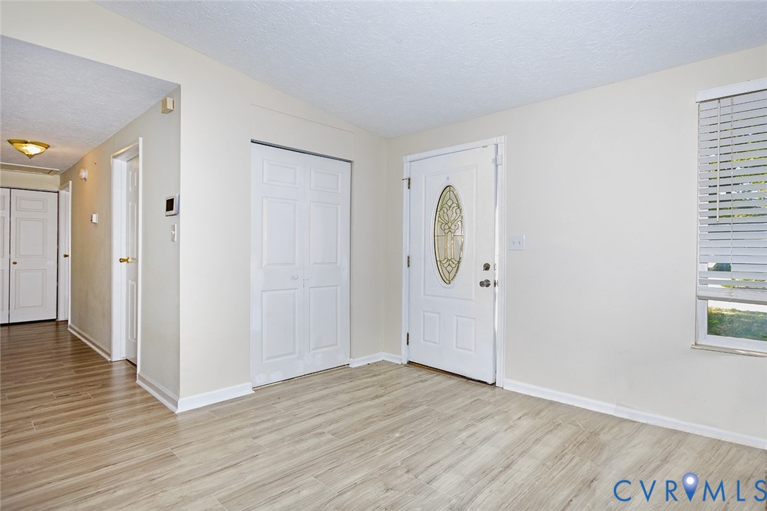 925 Fluvanna Road Newport News, VA 23601 - Photo 3 of 25 wooden floor in an empty room