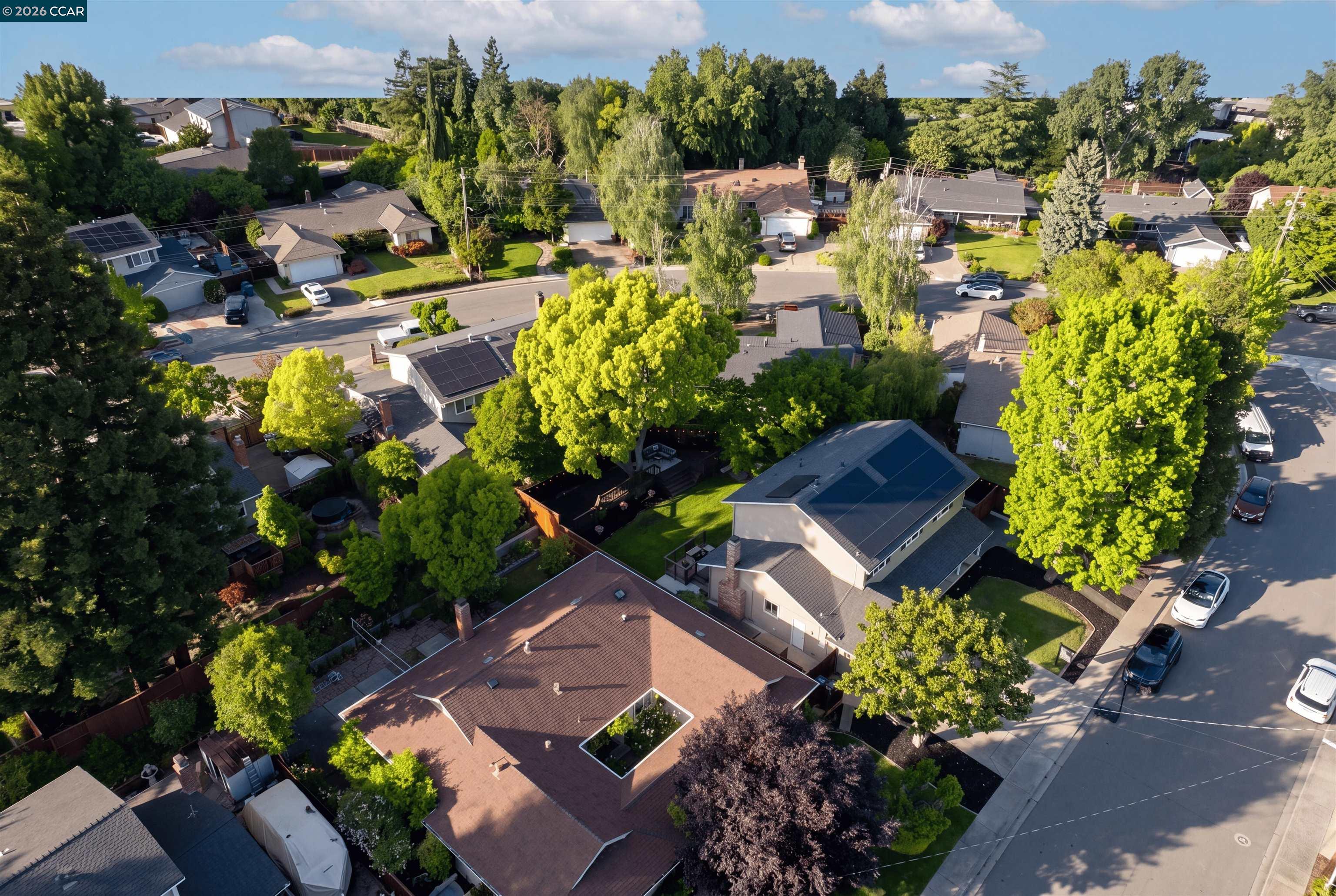 418 Devon Court San Ramon, CA 94583 - Photo 58 of 62 a view of a houses with flower plants