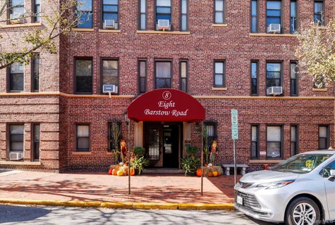 a kitchen with a stove and a refrigerator