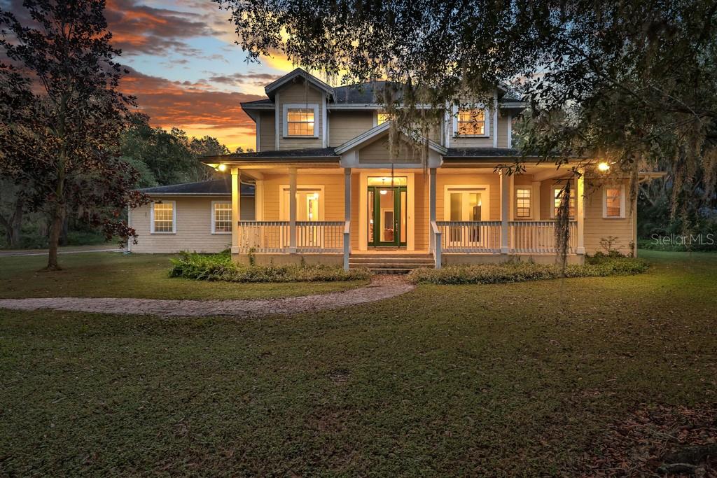 3370 Cooper Road Plant City, FL 33565 - Photo 1 of 1 a front view of a house with a yard