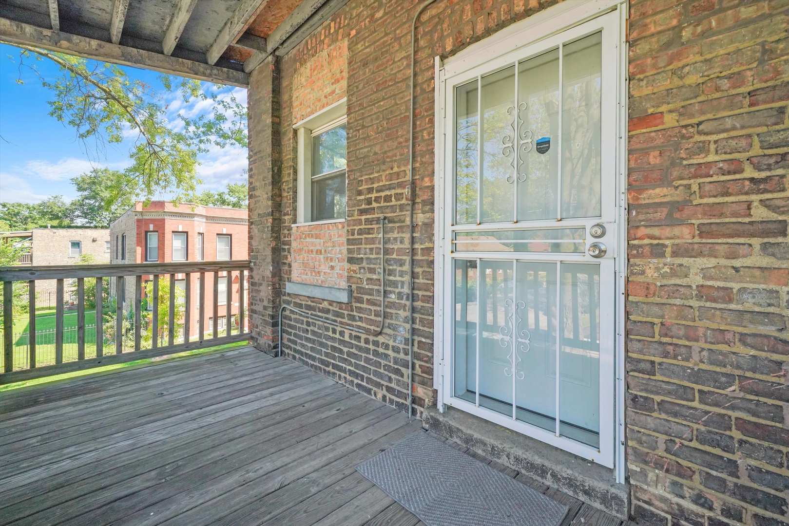 6600 South Marquette Road Chicago, IL 60637 - Photo 30 of 42 a view of a balcony with wooden floor