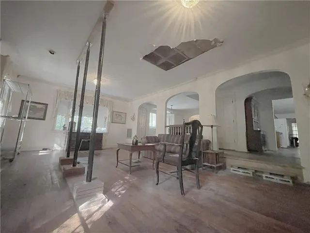 a view of a livingroom with furniture and a piano