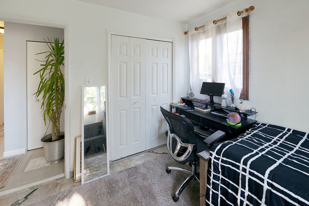 2503 Fulle Street Rolling Meadows, IL 60008 - Photo 13 of 17 a view of a workspace with furniture and a window
