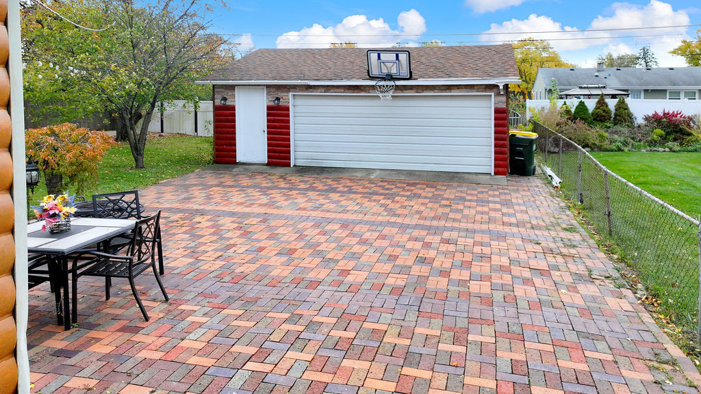 2503 Fulle Street Rolling Meadows, IL 60008 - Photo 16 of 17 a front view of a house with a yard and trees