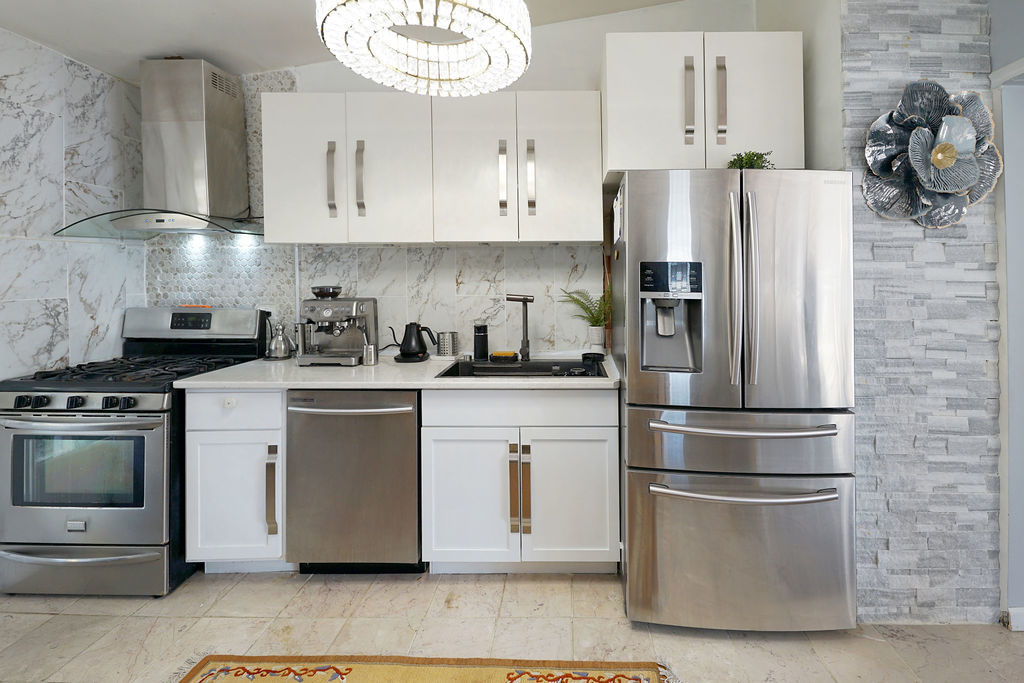 2503 Fulle Street Rolling Meadows, IL 60008 - Photo 2 of 17 a kitchen with stainless steel appliances granite countertop a refrigerator a stove and white cabinets