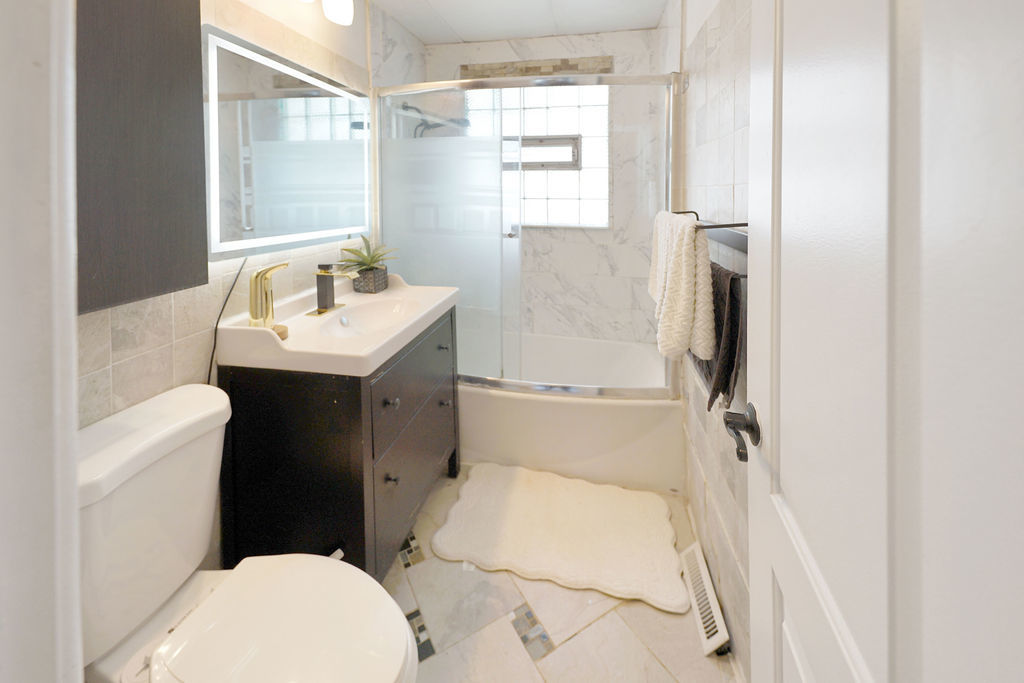 2503 Fulle Street Rolling Meadows, IL 60008 - Photo 10 of 17 a bathroom with a sink toilet and vanity