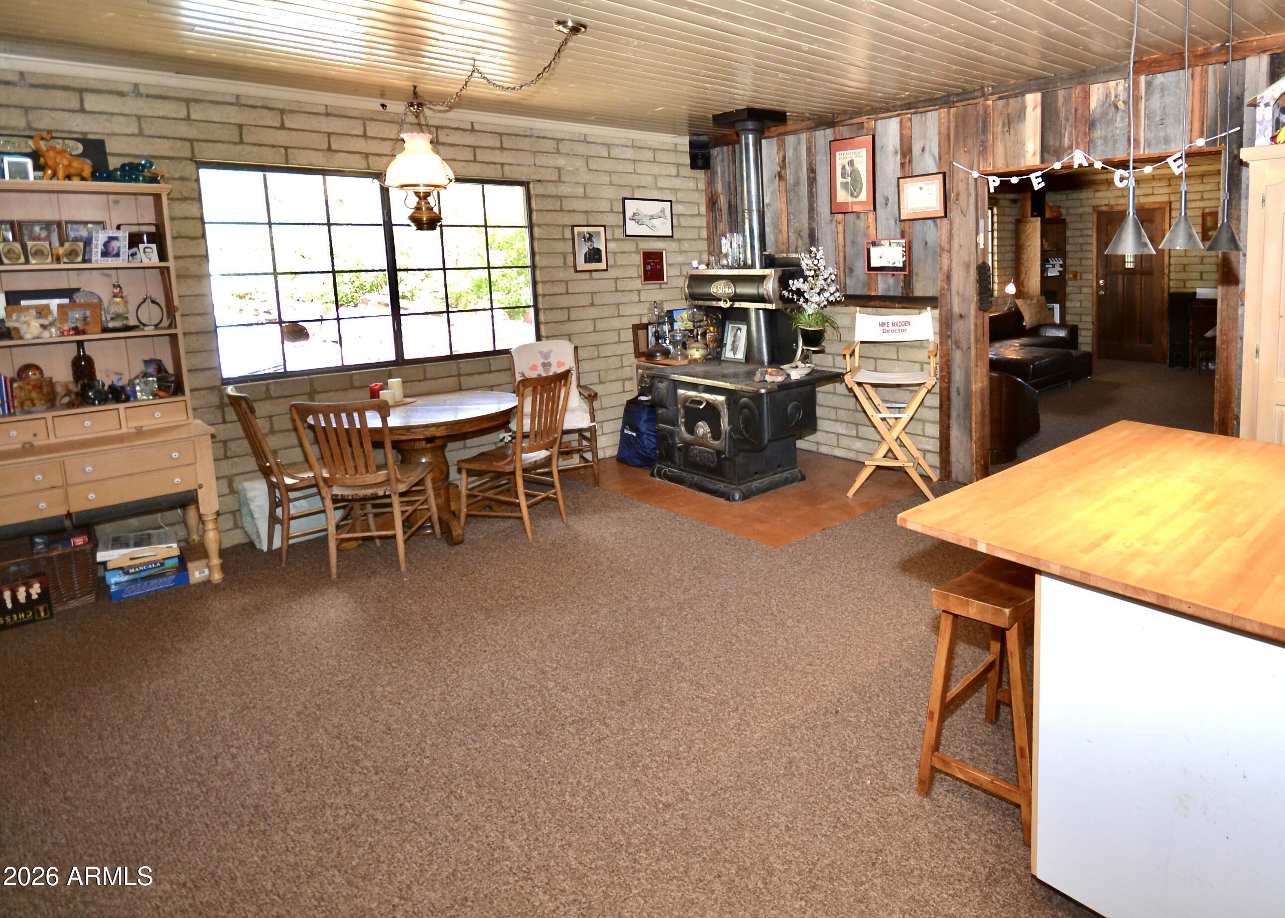 23617 South Demascus Road Crown King, AZ 86343 - Photo 5 of 50 a view of a livingroom with furniture and a window