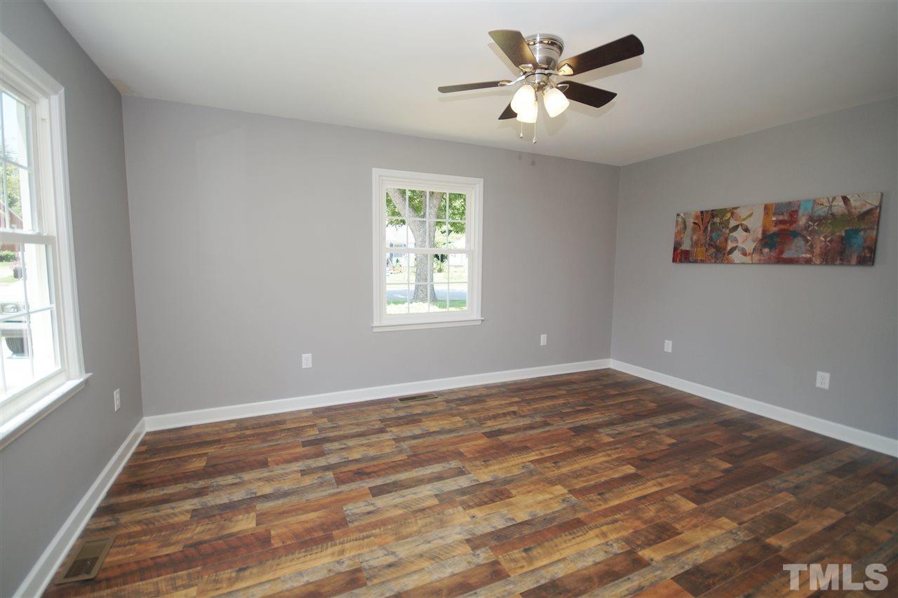 2717 Knowles Street Raleigh, NC 27603 - Photo 16 of 26 a view of an empty room with a window