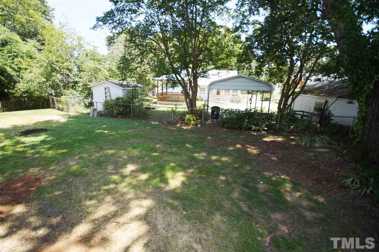 2717 Knowles Street Raleigh, NC 27603 - Photo 25 of 26 a view of a house with a yard