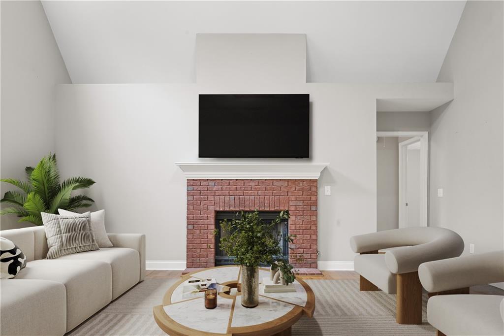 9375 Brian Boulevard Winston, GA 30187 - Photo 13 of 70 a living room with furniture and a fireplace