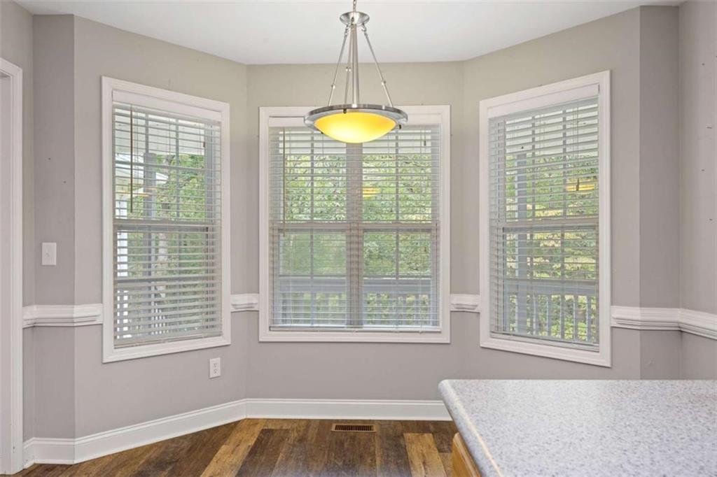9375 Brian Boulevard Winston, GA 30187 - Photo 22 of 70 a view of a room with windows and chandelier