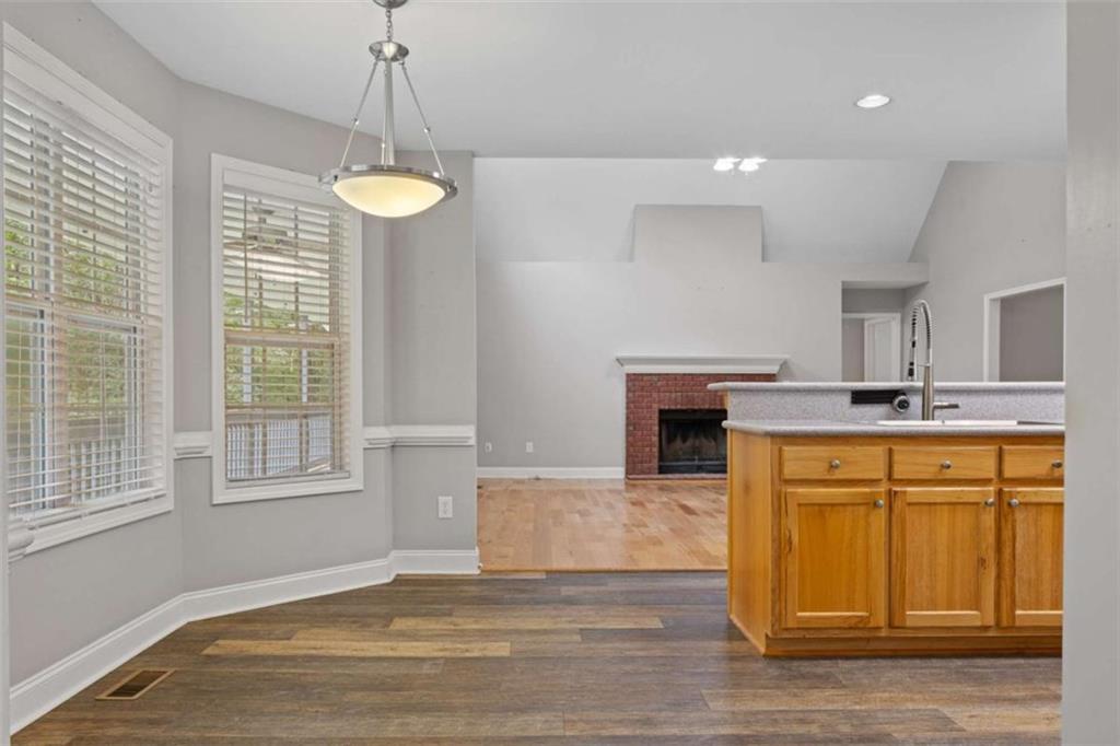 9375 Brian Boulevard Winston, GA 30187 - Photo 24 of 70 a view of a kitchen with a sink dishwasher and fireplace