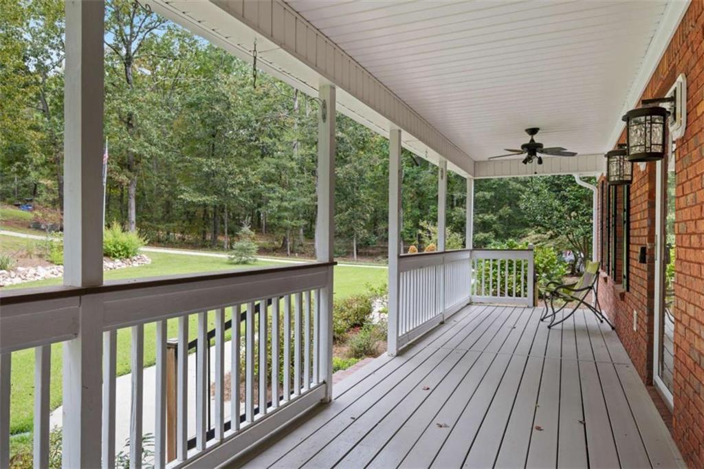9375 Brian Boulevard Winston, GA 30187 - Photo 3 of 70 a view of a balcony with wooden floor