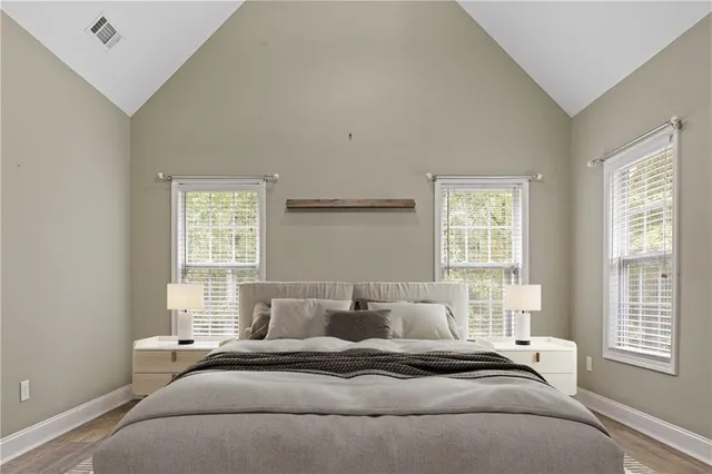a bathroom with bathtub and window