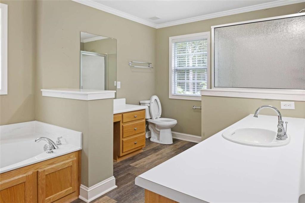 9375 Brian Boulevard Winston, GA 30187 - Photo 32 of 70 a bathroom with a sink toilet and tub
