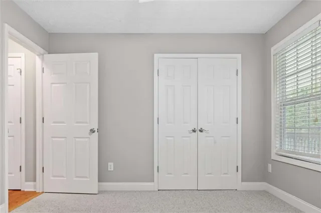 a view of balcony with wooden floor