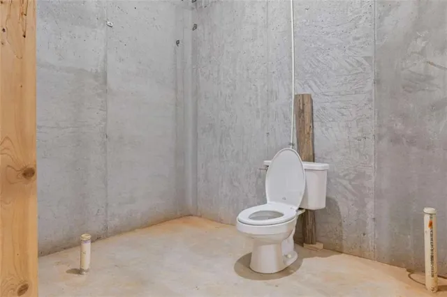 an aerial view of a house with outdoor space and street view