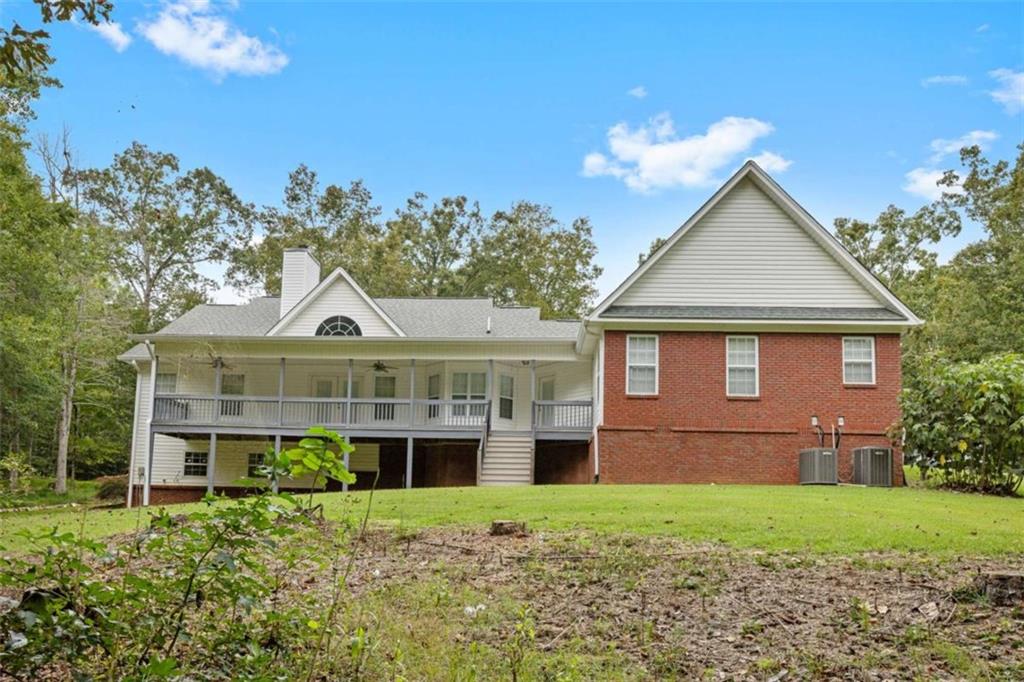 9375 Brian Boulevard Winston, GA 30187 - Photo 62 of 70 a front view of a house with a yard