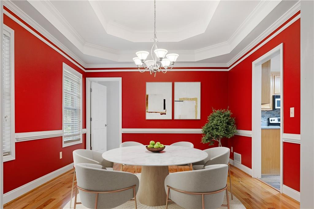 9375 Brian Boulevard Winston, GA 30187 - Photo 9 of 70 a dining room with furniture a chandelier and window