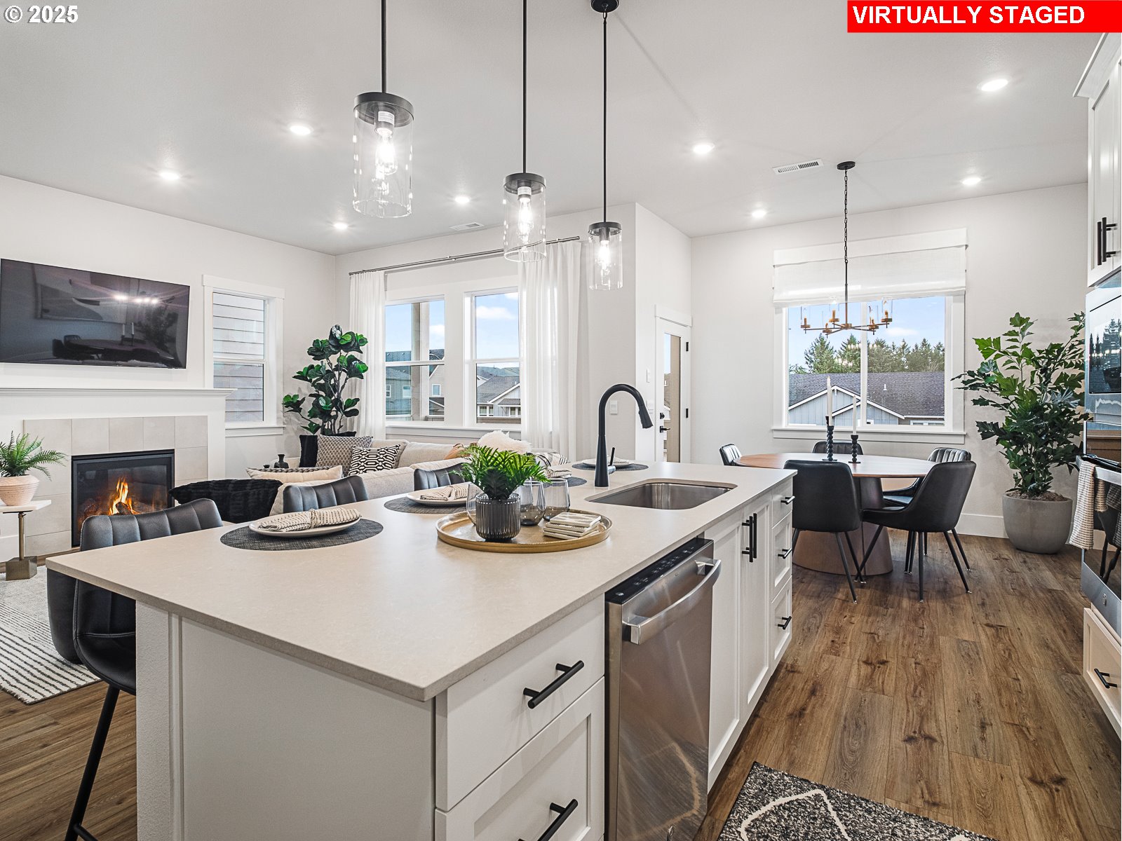 18045 Southwest Monashee Lane Beaverton, OR 97007 - Photo 12 of 45 a kitchen with sink a counter space and living room