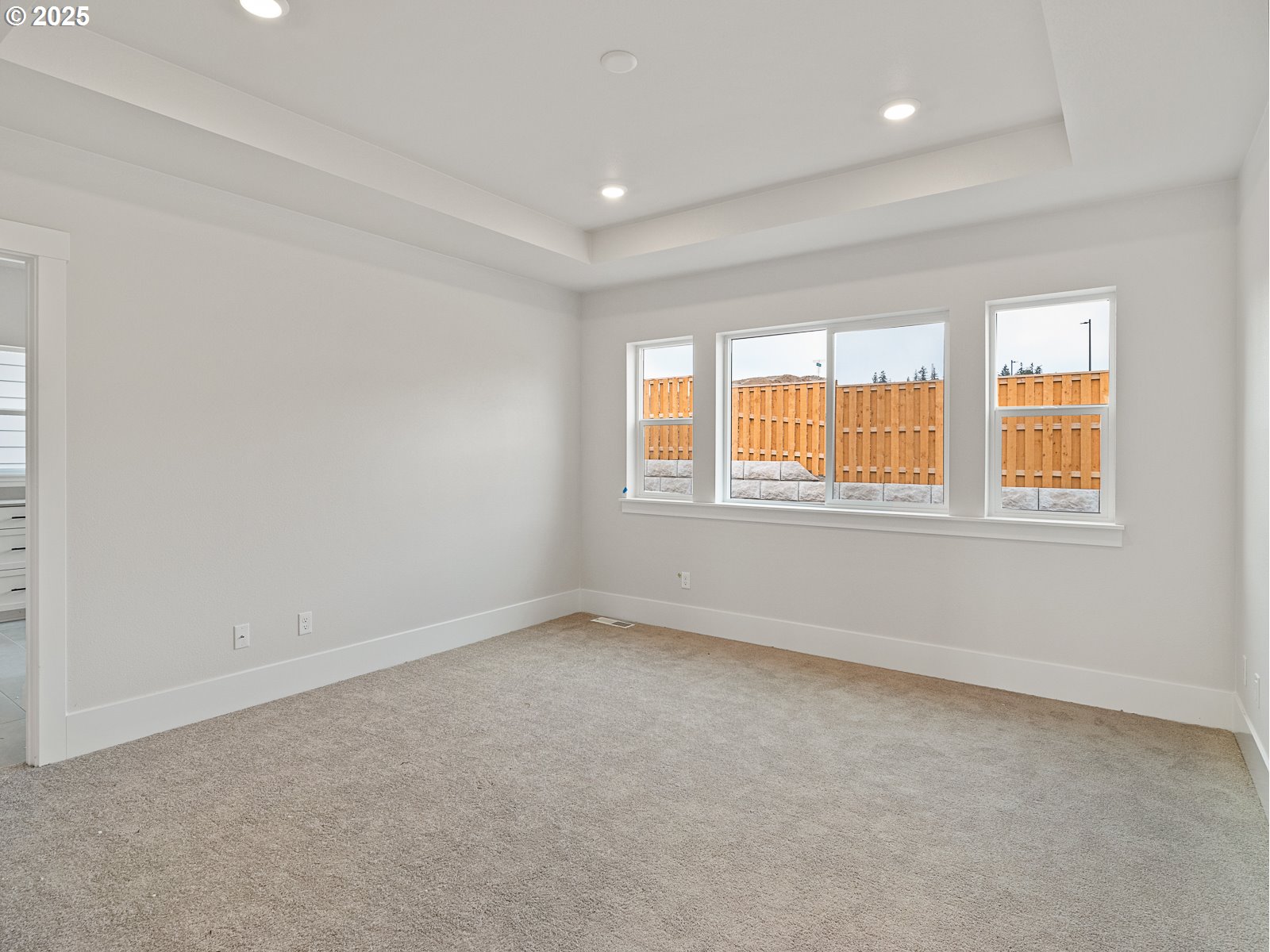 18045 Southwest Monashee Lane Beaverton, OR 97007 - Photo 34 of 45 an empty room with windows