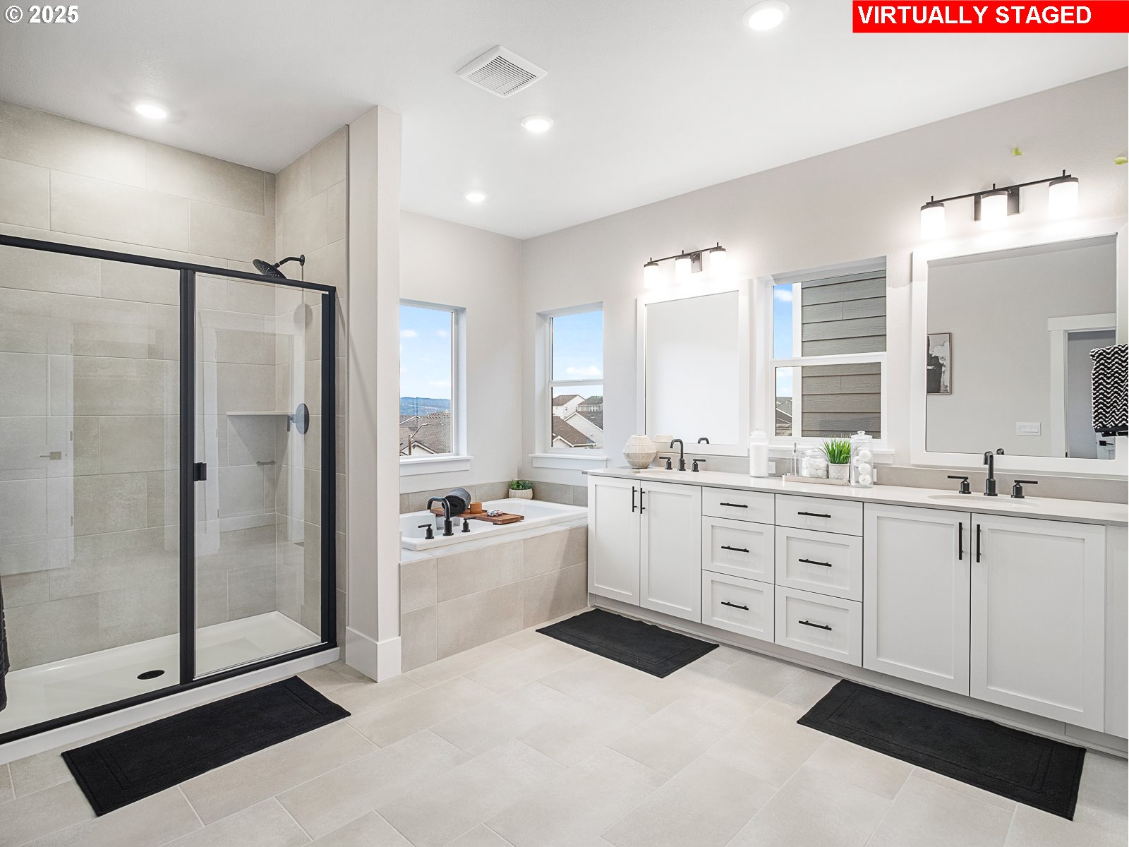 18045 Southwest Monashee Lane Beaverton, OR 97007 - Photo 44 of 45 a large bathroom with a double vanity sink a large mirror and shower