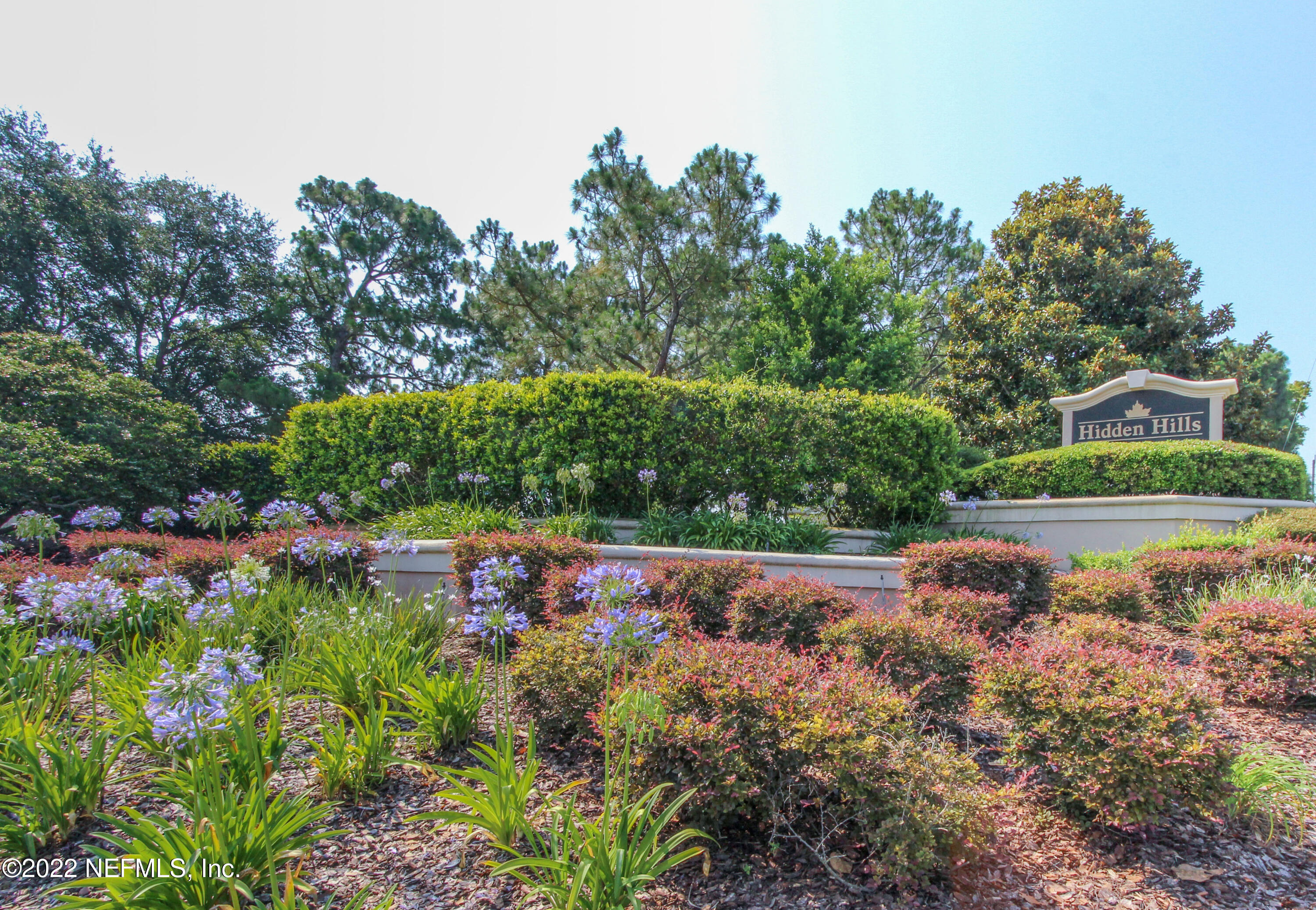 12466 Masters Ridge Drive Jacksonville, FL 32225 - Photo 54 of 65 Hidden Hills Entrance Sign