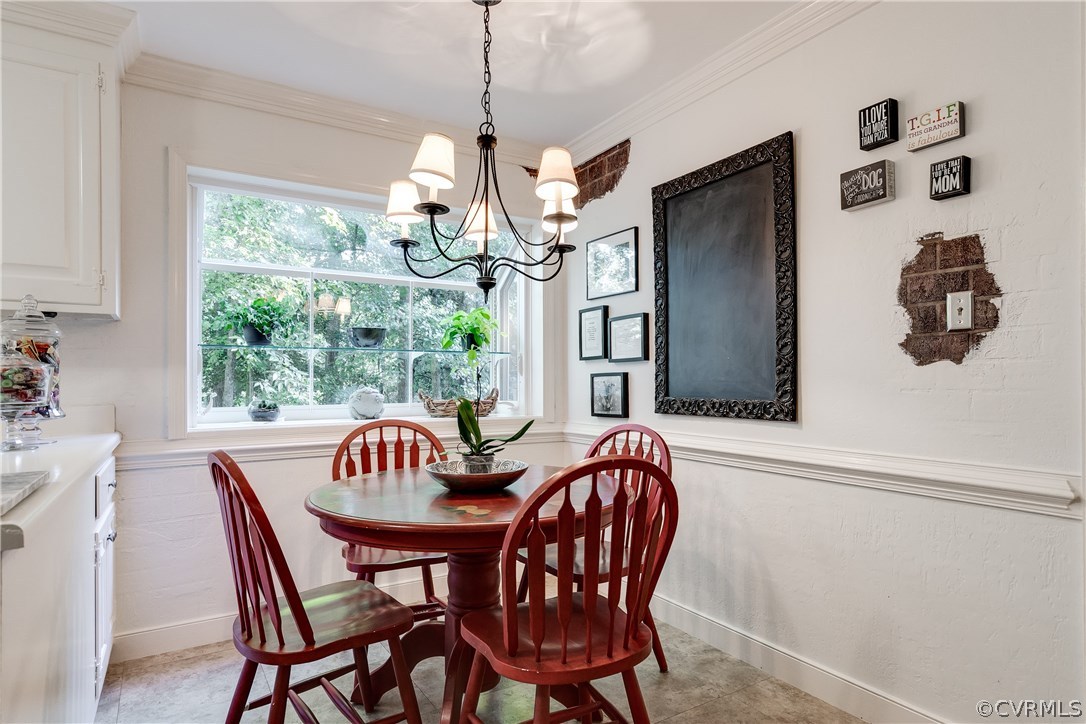 13507 Queensgate Road Midlothian, VA 23114 - Photo 14 of 45 a view of a dining room with furniture window and outside view