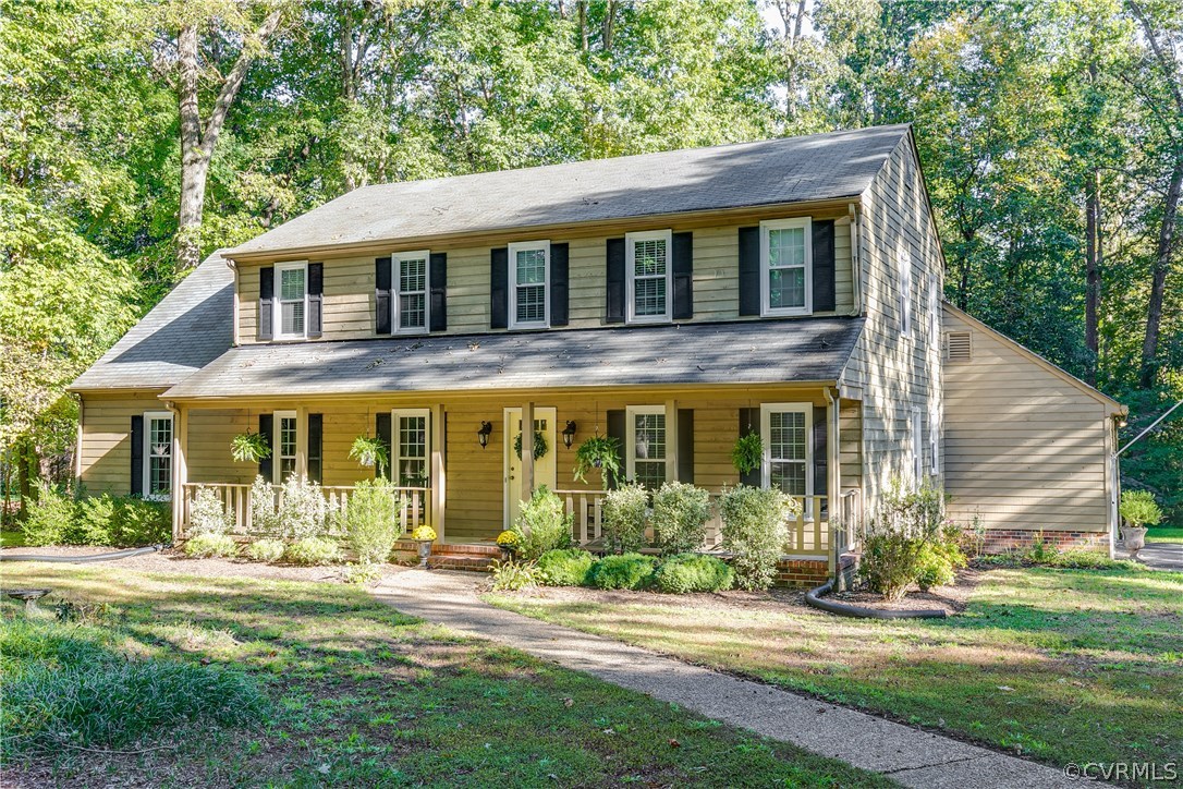 13507 Queensgate Road Midlothian, VA 23114 - Photo 2 of 45 a front view of a house with a yard