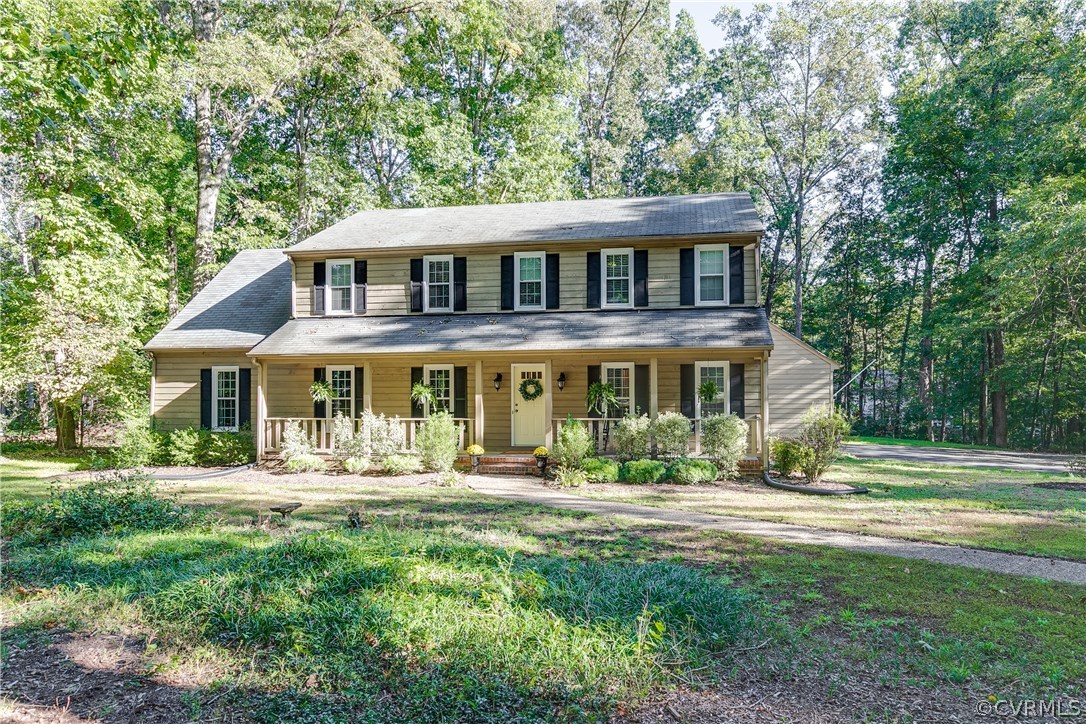 13507 Queensgate Road Midlothian, VA 23114 - Photo 3 of 45 a front view of a house with garden