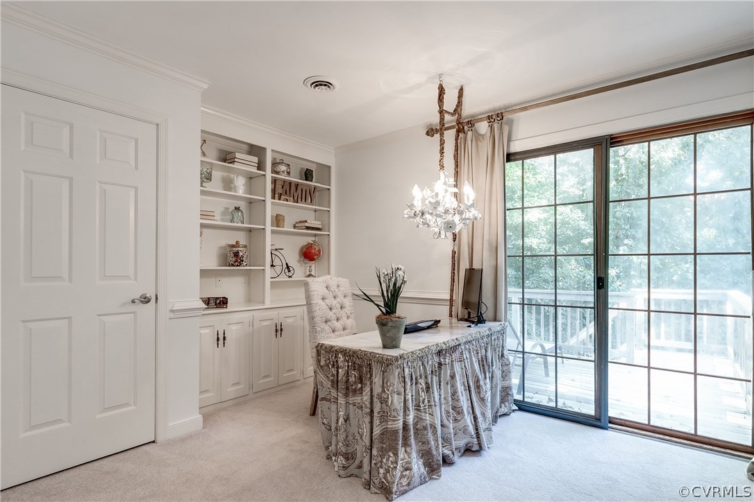 13507 Queensgate Road Midlothian, VA 23114 - Photo 36 of 45 a bedroom with furniture and a chandelier