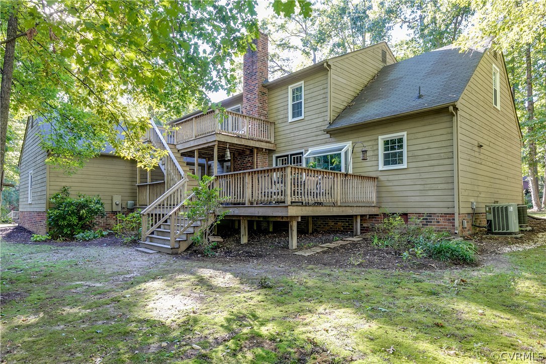 13507 Queensgate Road Midlothian, VA 23114 - Photo 38 of 45 a view of a house with backyard and sitting area